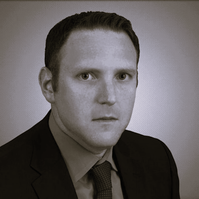 paul black and white headshot for licensing and trademark podcast