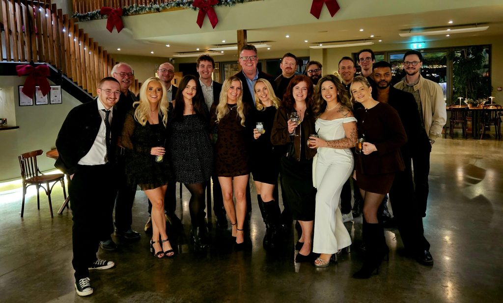 picture of the ecomone team at the christmas do at doddington hall