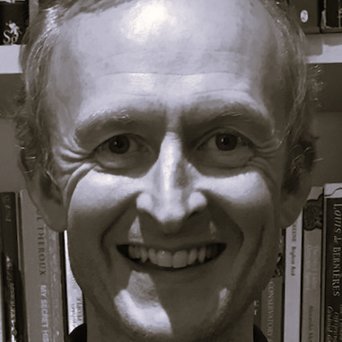 black and white headshot of ben grass